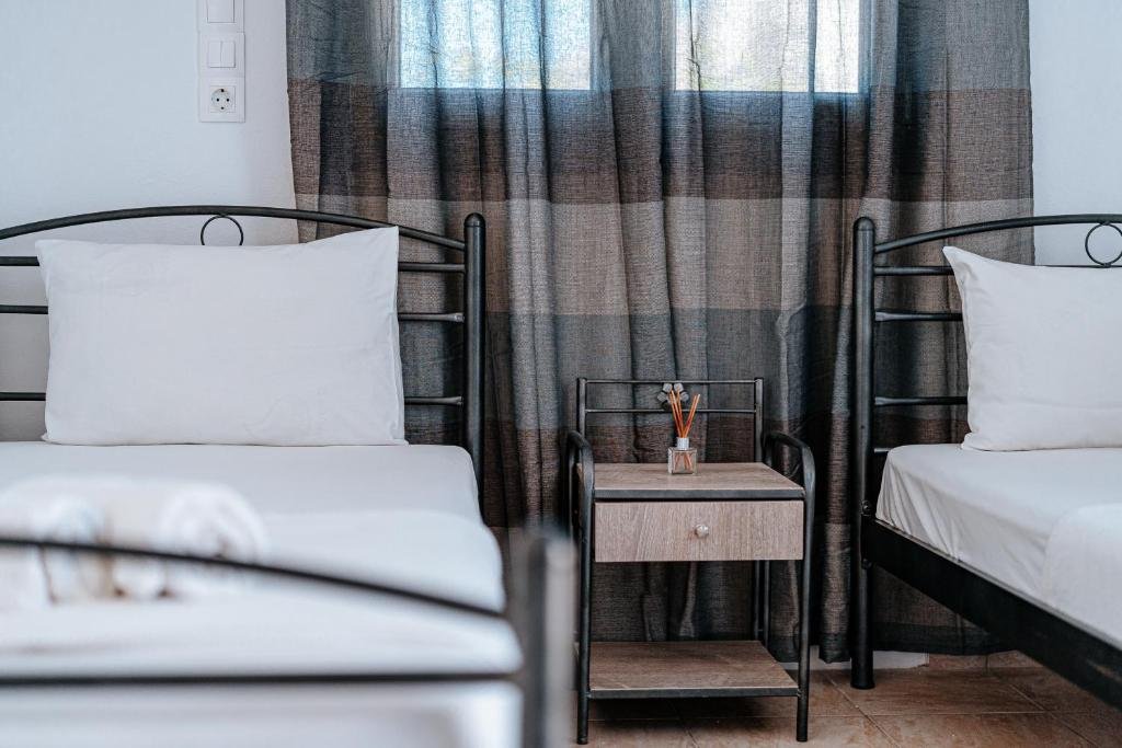 Cameră Dublă Marousi Rooms cu 2 paturi individuale