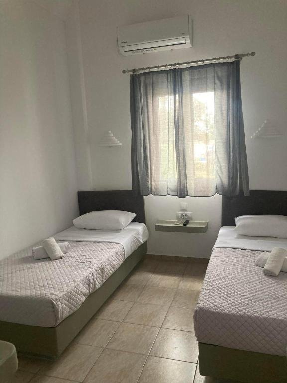 Habitación Doble Económica de Marousi Rooms con 2 camas individuales